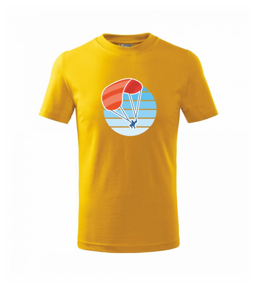 Paragliding oranžový v modrom koliesku