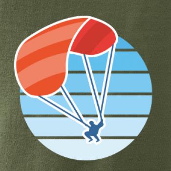 Paragliding oranžový v modrom koliesku Paragliding oranžový v modrom koliesku