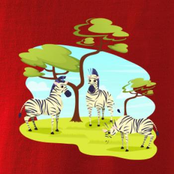 Zebry pod stromom
