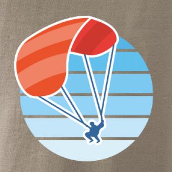 Paragliding oranžový v modrom koliesku Paragliding oranžový v modrom koliesku