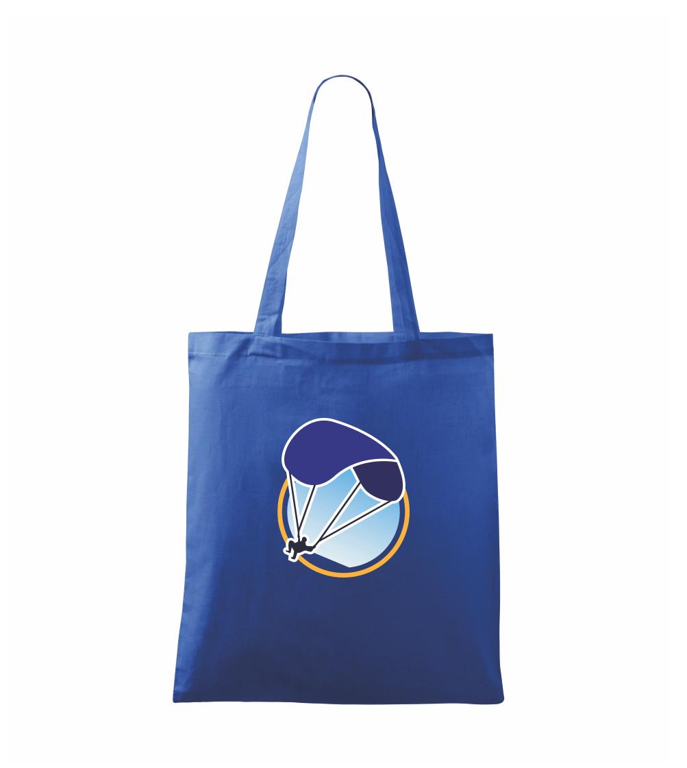 Paragliding modrý padák v kruhu