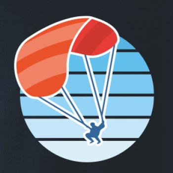 Paragliding oranžový v modrom koliesku