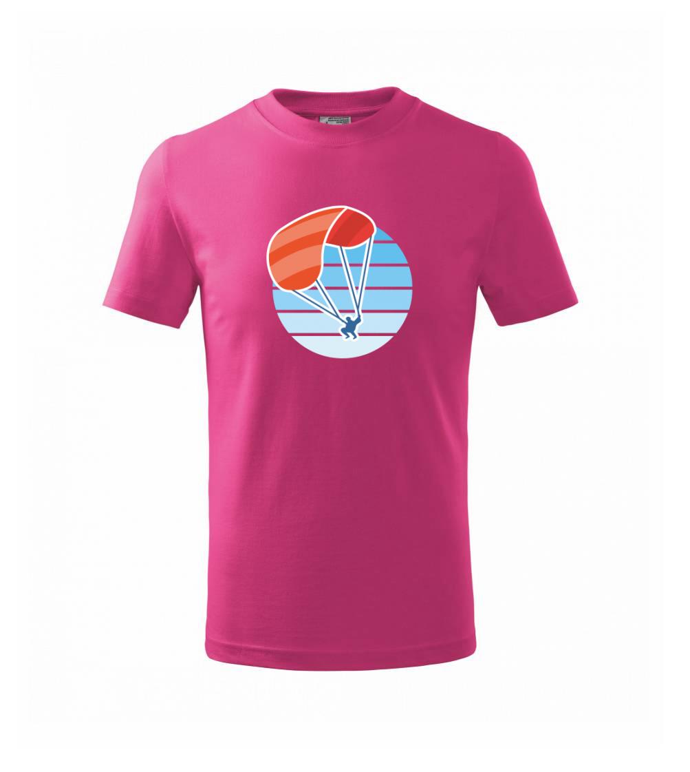 Paragliding oranžový v modrom koliesku