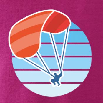 Paragliding oranžový v modrom koliesku