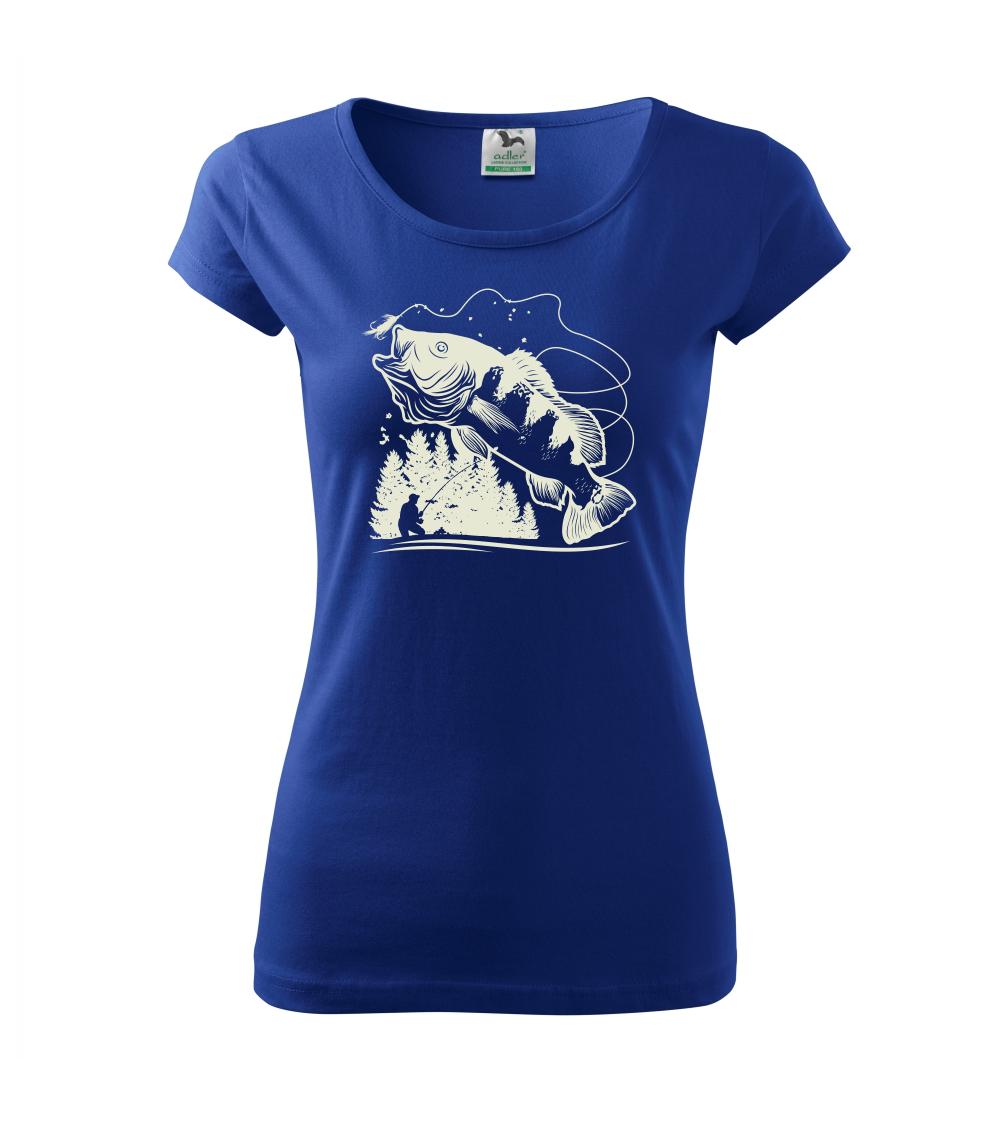 Rybár na brehu rybníka muškári