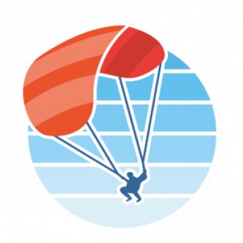 Paragliding oranžový v modrom koliesku