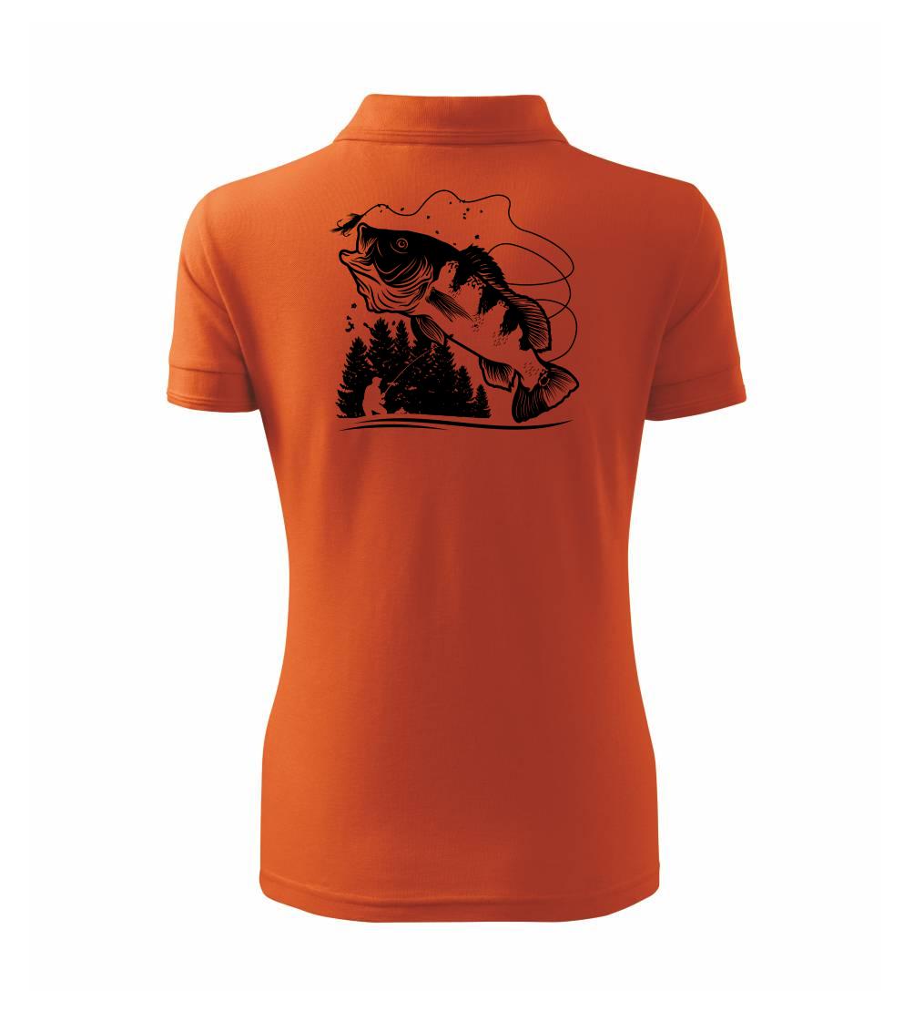 Rybár na brehu rybníka muškári