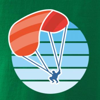 Paragliding oranžový v modrom koliesku