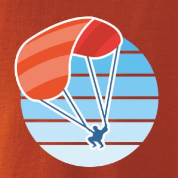 Paragliding oranžový v modrom koliesku