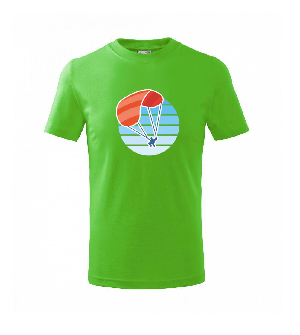 Paragliding oranžový v modrom koliesku