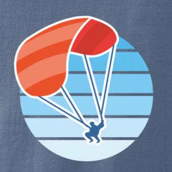 Paragliding oranžový v modrom koliesku Paragliding oranžový v modrom koliesku