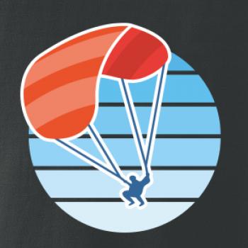 Paragliding oranžový v modrom koliesku