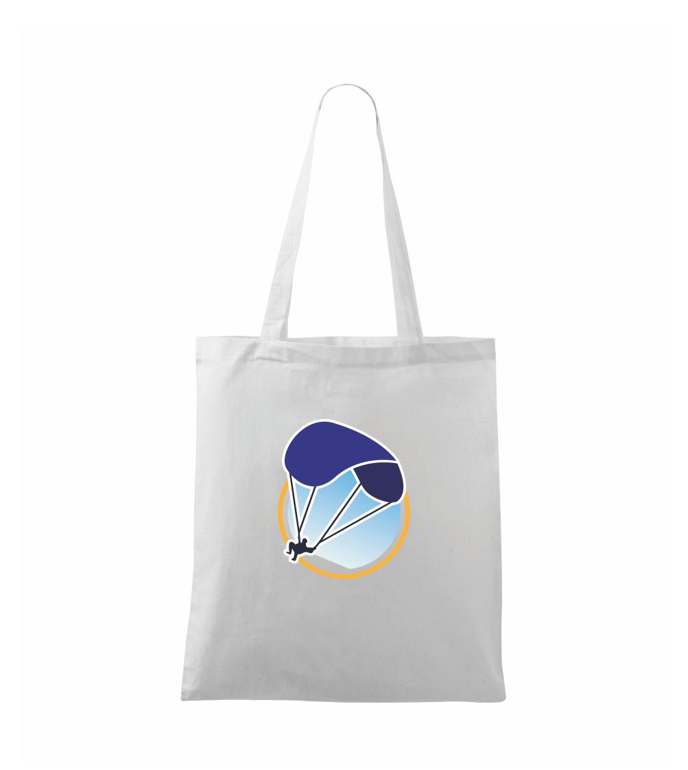 Paragliding modrý padák v kruhu