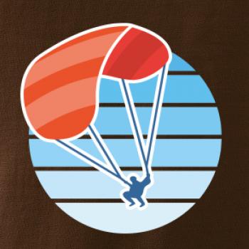 Paragliding oranžový v modrom koliesku