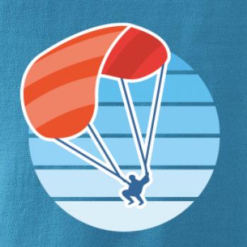 Paragliding oranžový v modrom koliesku Paragliding oranžový v modrom koliesku