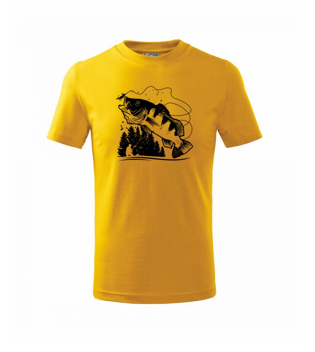 Rybár na brehu rybníka muškári