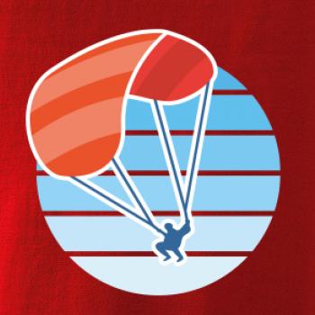 Paragliding oranžový v modrom koliesku