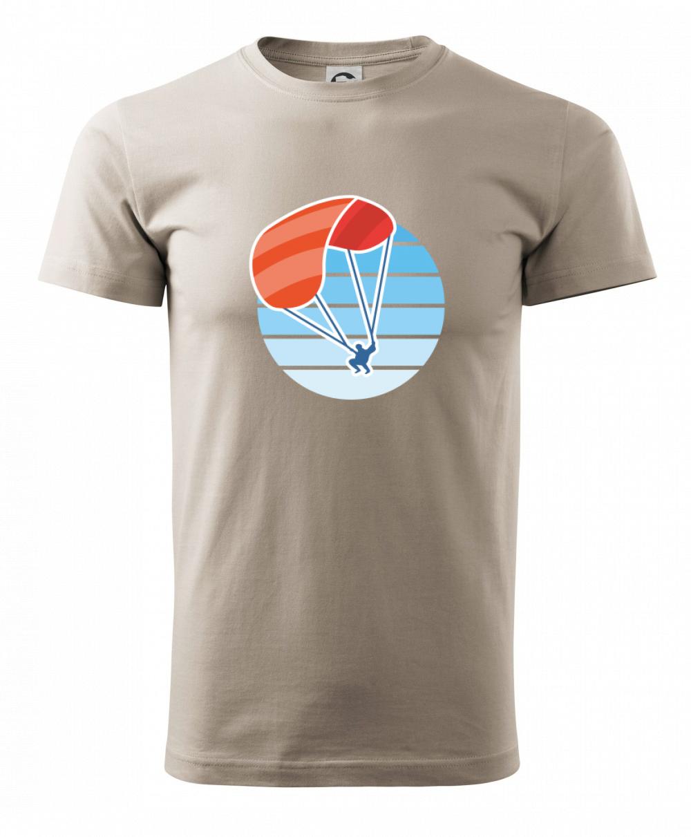 Paragliding oranžový v modrom koliesku Paragliding oranžový v modrom koliesku