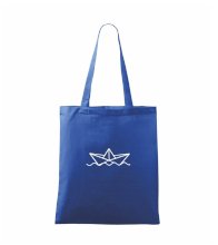 Papierová loďka na vode