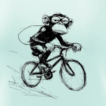 Opice s batohom na bicykli