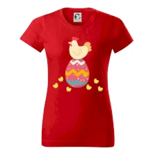 Sliepka sediaca na veľkonočnom vajci