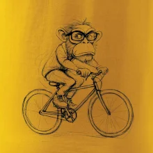 Opice s okuliarmi na bicykli