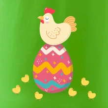 Sliepka sediaca na veľkonočnom vajci