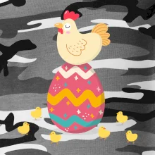 Sliepka sediaca na veľkonočnom vajci