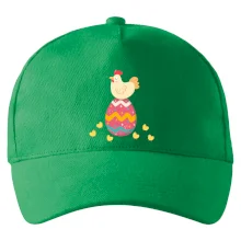 Sliepka sediaca na veľkonočnom vajci