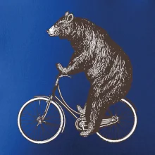 Medveď na bicykli