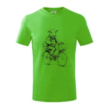 Krava v obleku na bicykli