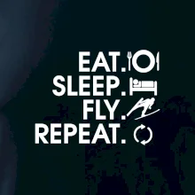 Eat sleep fly repeat - skoky na lyžiach