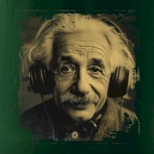 Albert Einstein so slúchadlami Albert Einstein so slúchadlami