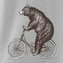 Medveď na bicykli