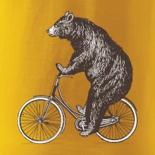 Medveď na bicykli
