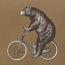 Medveď na bicykli