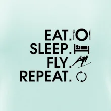 Eat sleep fly repeat - skoky na lyžiach
