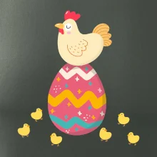 Sliepka sediaca na veľkonočnom vajci