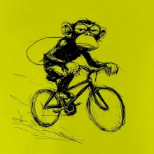 Opice s batohom na bicykli