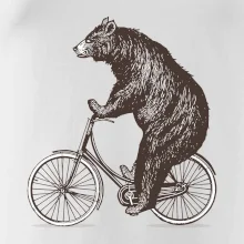 Medveď na bicykli