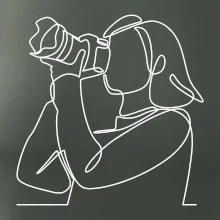 Fotografka stojaca jedným ťahom Fotografka stojaca jedným ťahom