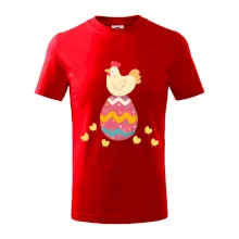 Sliepka sediaca na veľkonočnom vajci