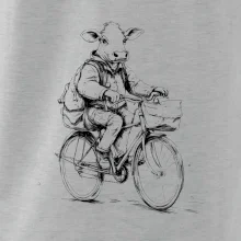 Krava v obleku na bicykli