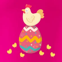 Sliepka sediaca na veľkonočnom vajci