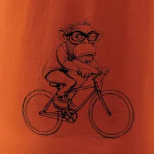 Opice s okuliarmi na bicykli