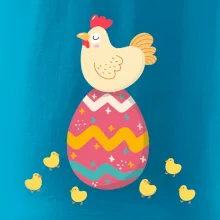 Sliepka sediaca na veľkonočnom vajci