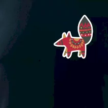 Folklór na prsníku líška