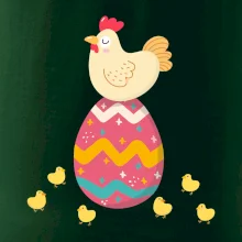 Sliepka sediaca na veľkonočnom vajci