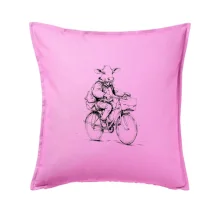 Krava v obleku na bicykli