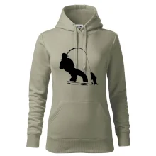 Rybár ťahajúce rybu